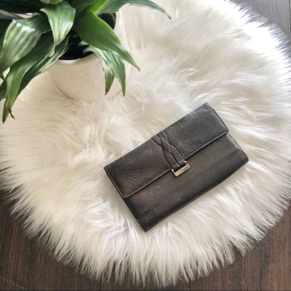 Vintage trifold brown leather wallet